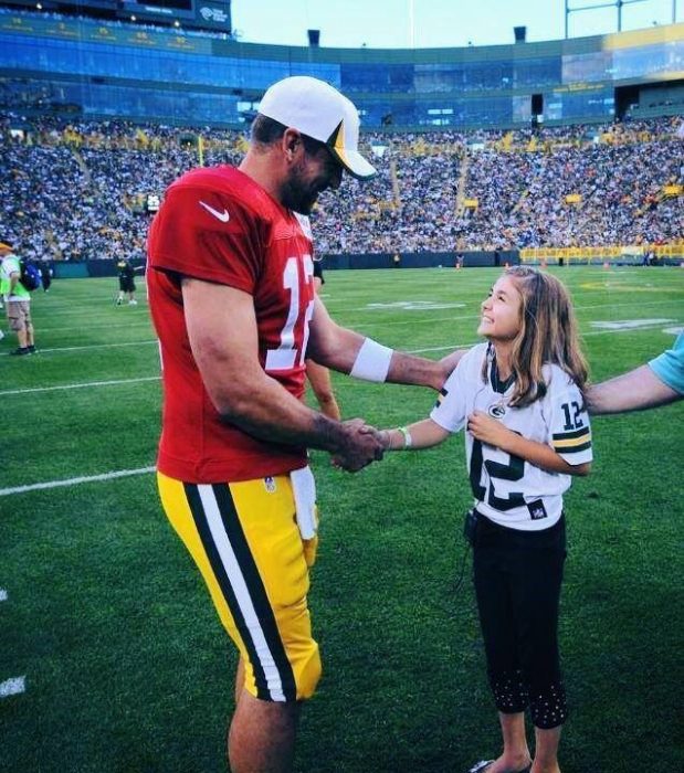 Franki Moscato and Aaron Rodgers